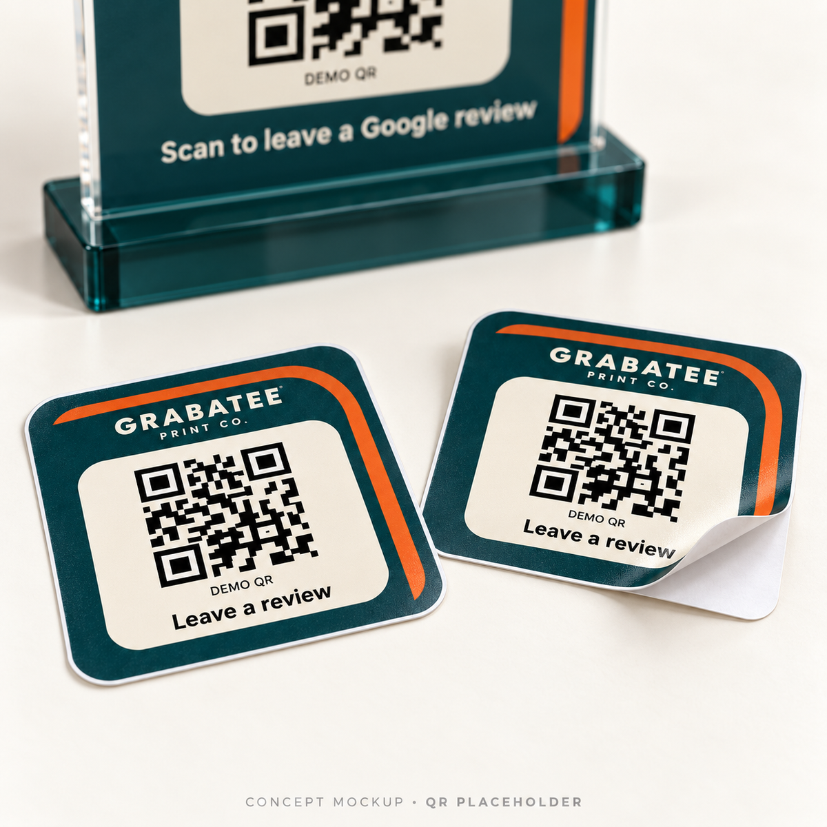 CounterCue concept close-up of matching teal and orange vinyl review stickers, one partially peeled from its liner; placeholder QR codes.